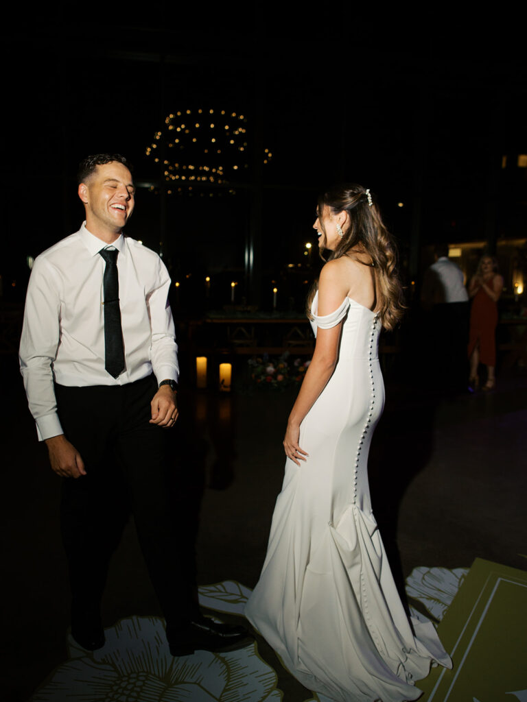 bride and groom dancing