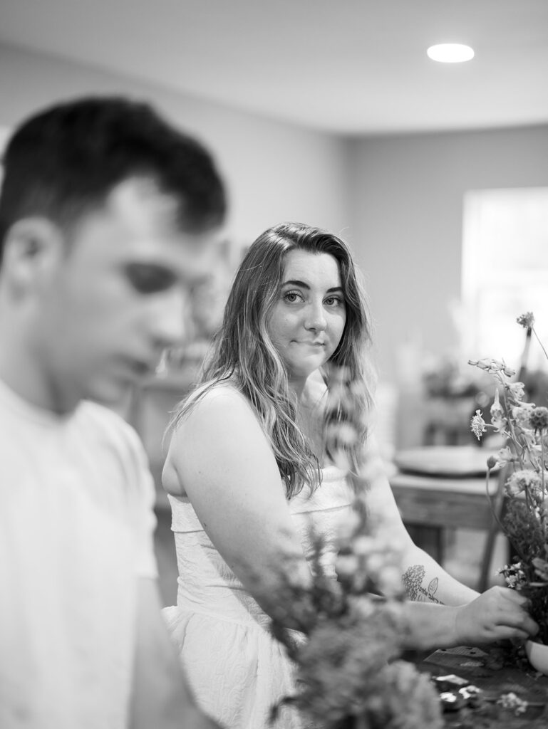 romantic engagement photos with floral arrangements
