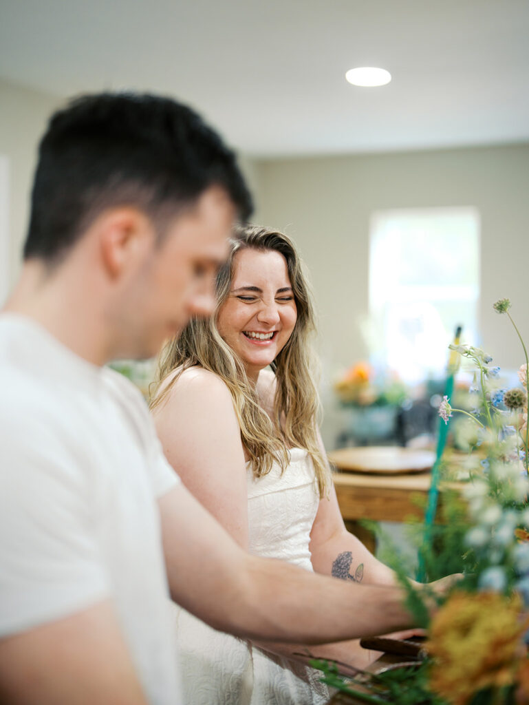 romantic engagement photos with floral arrangements