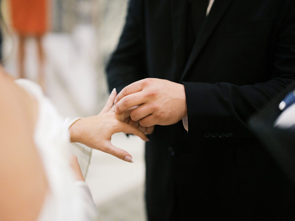bride and groom getting married in the houston courthouse