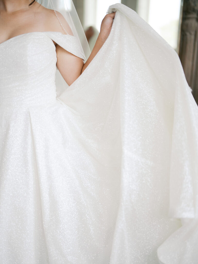 wedding detail photos of the bride in her dress