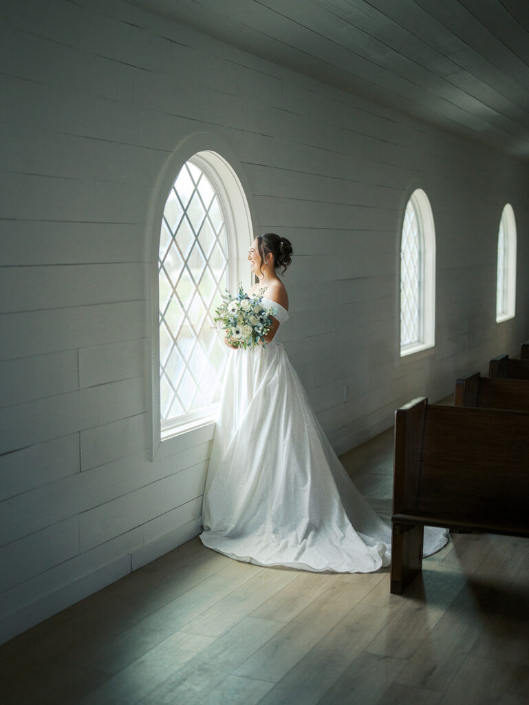 timeless wedding photos of the bride with her bouquet