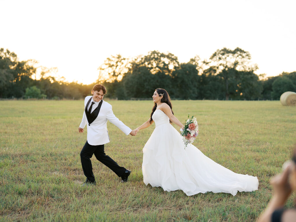 bride and groom portraits at the windrow events in a field