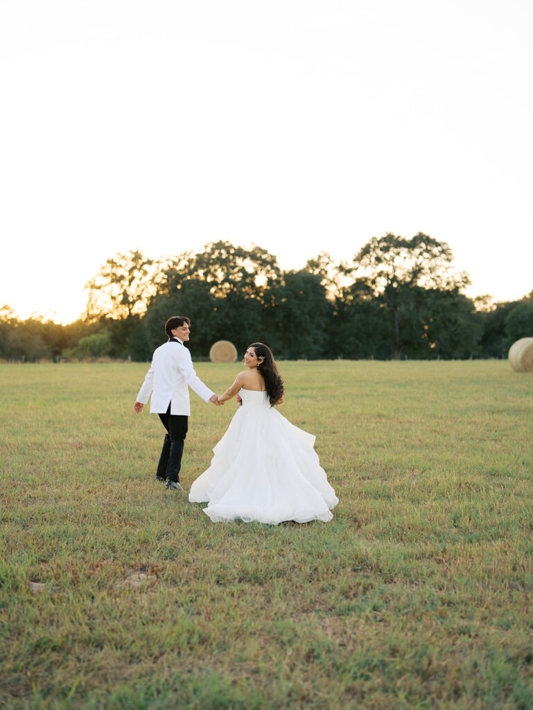 bride and groom portraits at the windrow events in a field