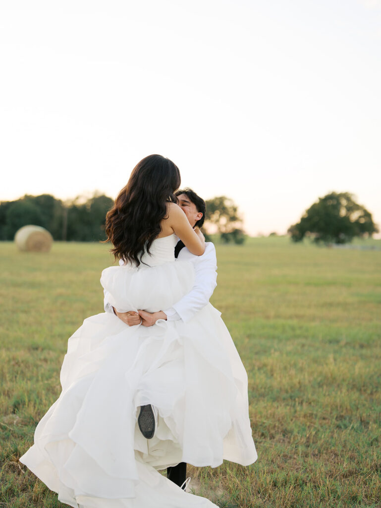bride and groom portraits at the windrow events in a field