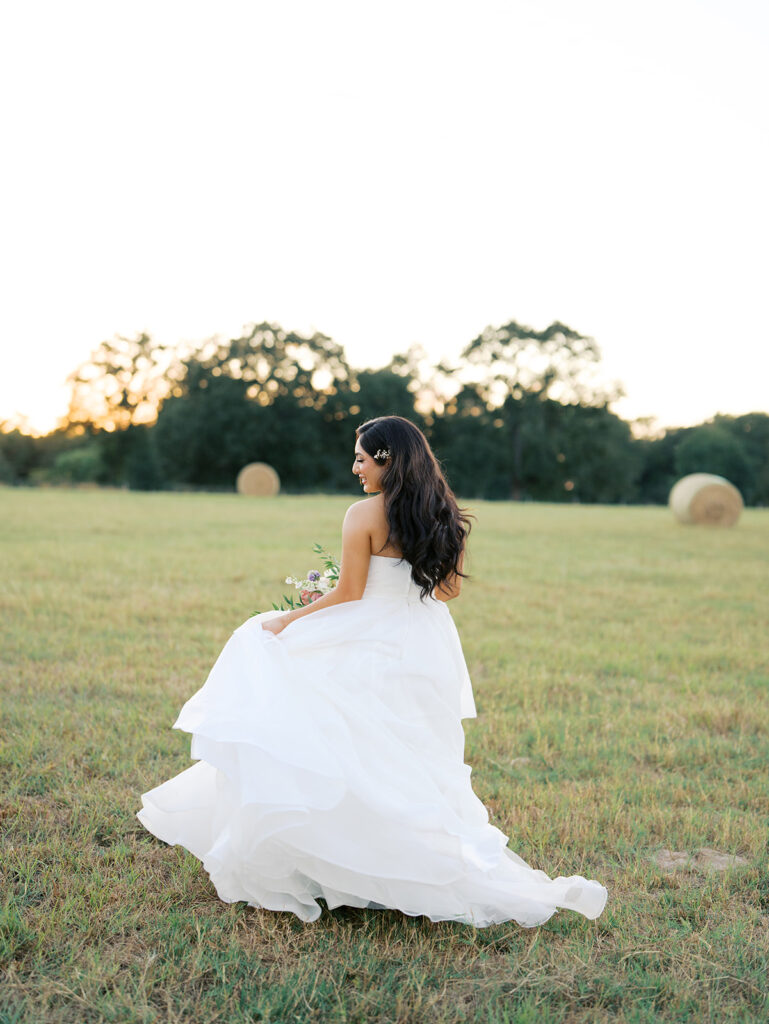 bride and groom portraits at the windrow events in a field