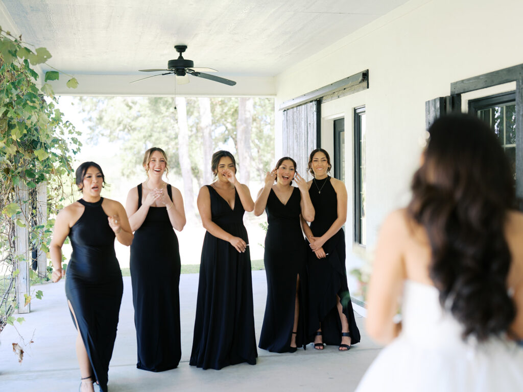 documentary style wedding photos of bride with her bridesmaids