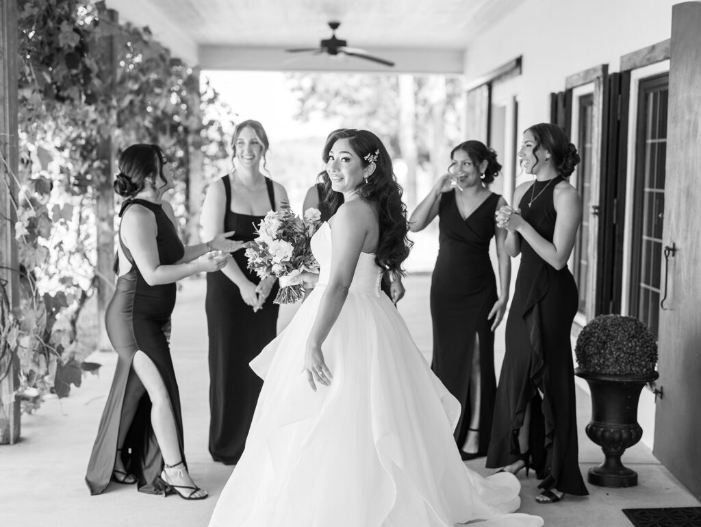 documentary style wedding photos of bride with her bridesmaids
