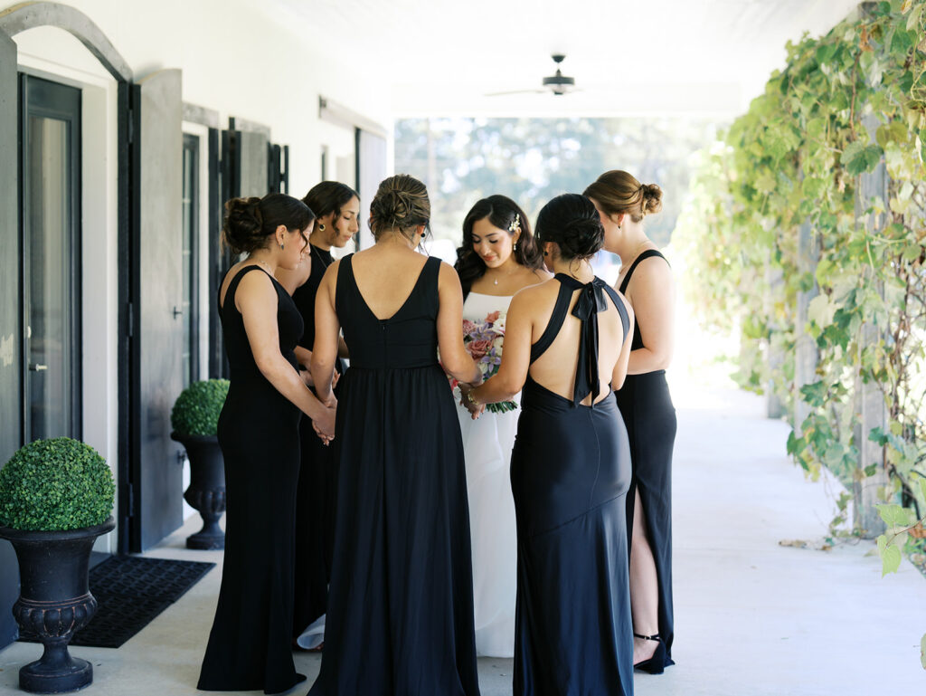 documentary style wedding photos of bride with her bridesmaids