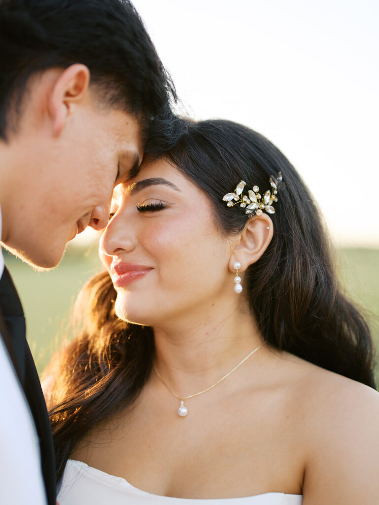 bride and groom portraits at the windrow events in a field