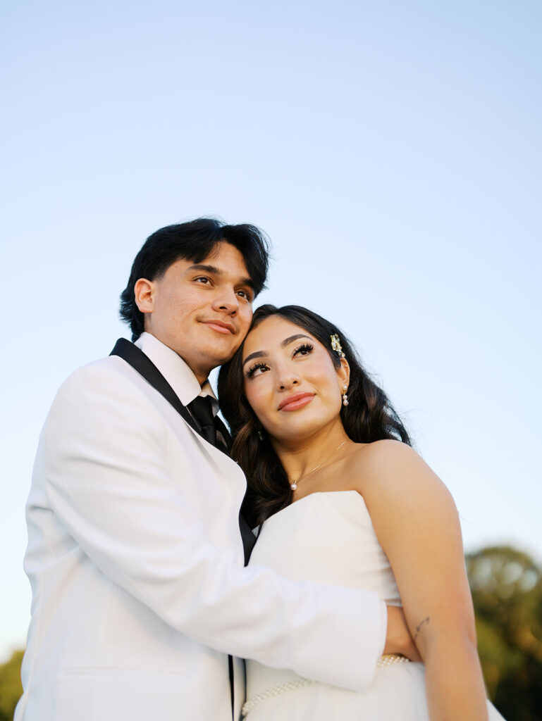 bride and groom portraits at the windrow events in a field