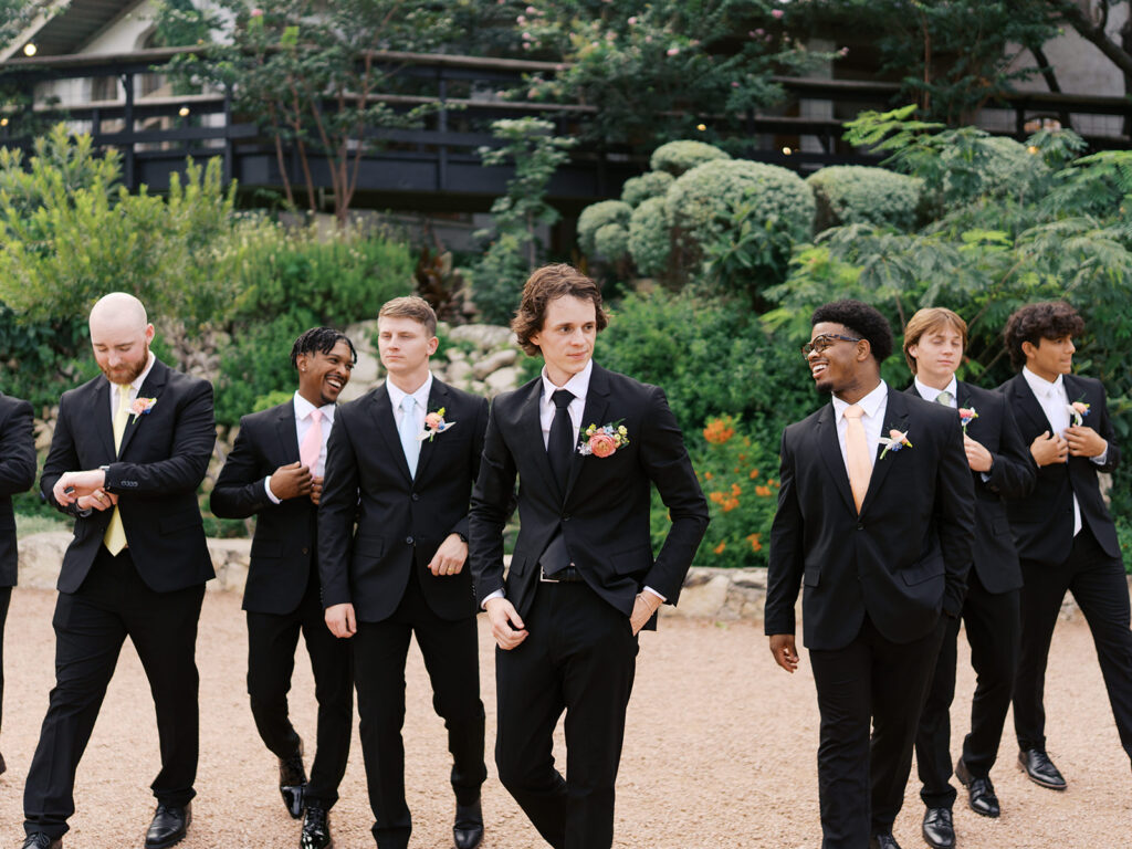 bridal party photos on film with spring colors and candid poses at Villa Antonia Austin