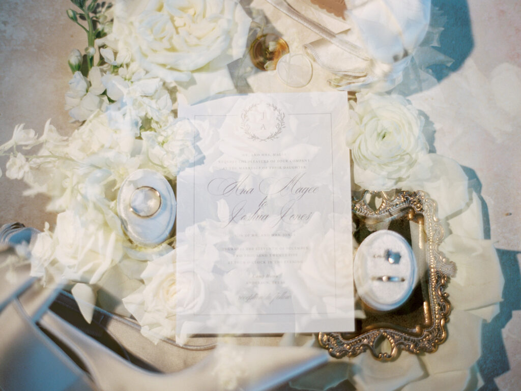 double exposure wedding details flatlay photo with white florals