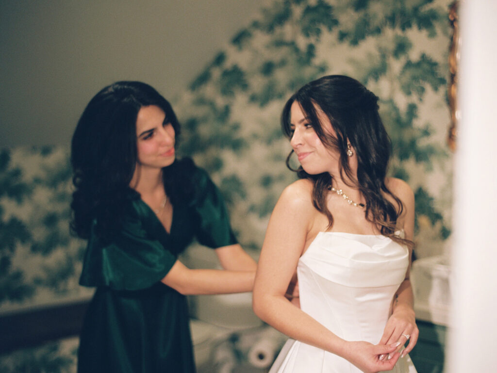 soft grainy film wedding photos of bride getting ready