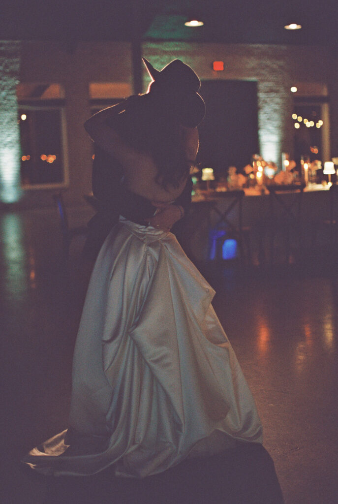bride and groom share an intimate first dance together