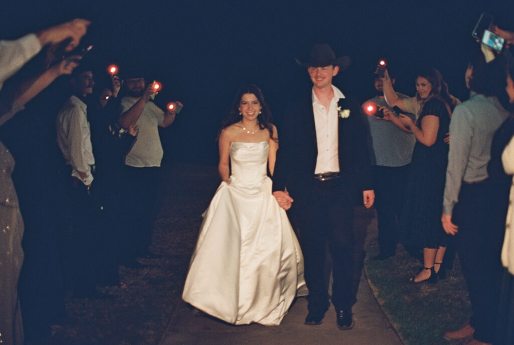 bride and groom wedding exit photos on film