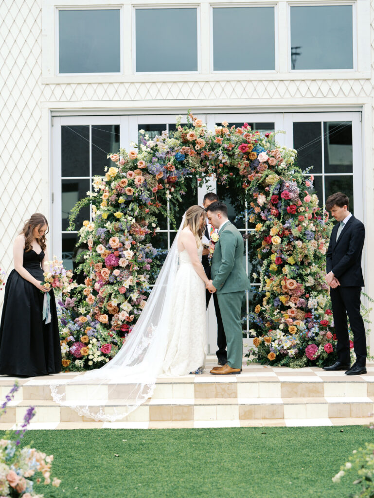 prayer during ceremony at wedding in austin