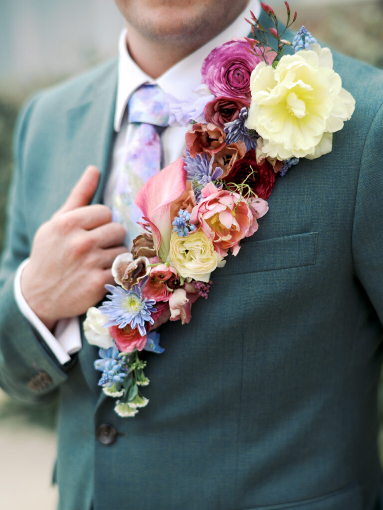 groom wedding day boutonniere spring wedding color palette spring wedding theme