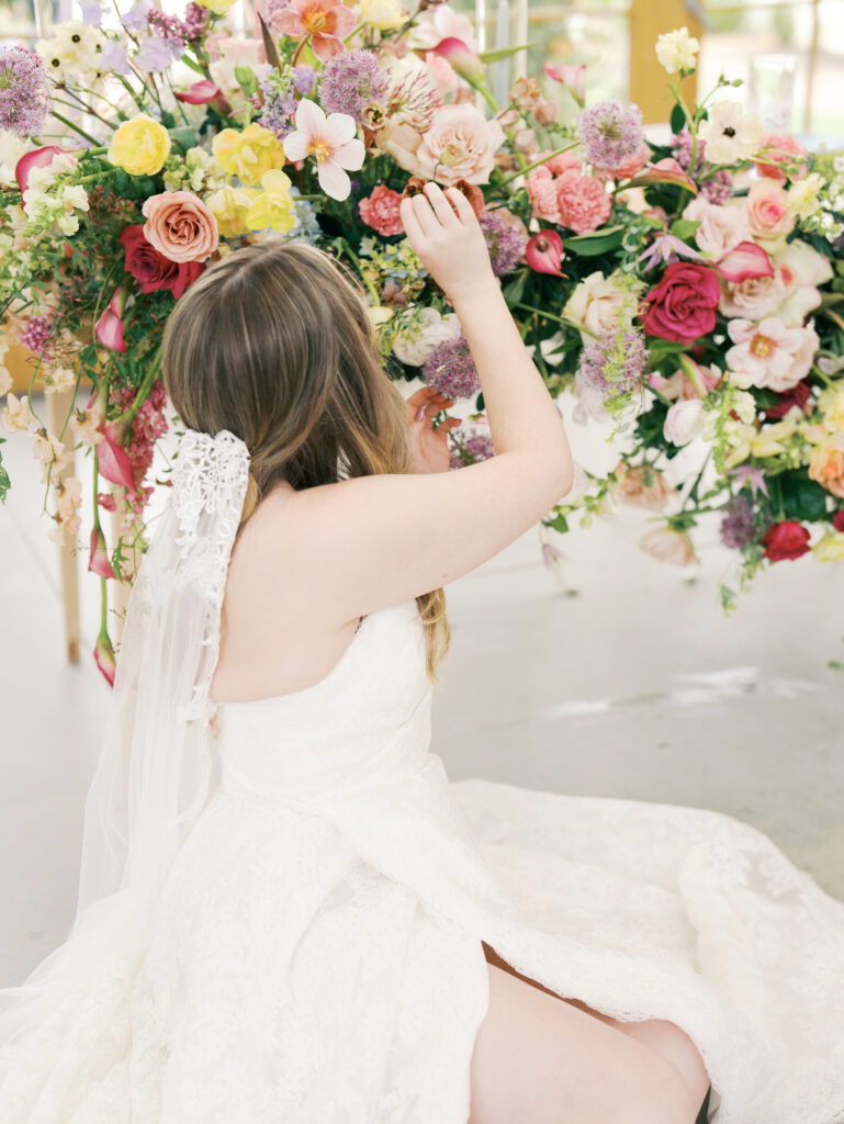 bride with florals at wedding in austin spring wedding color palette spring wedding theme