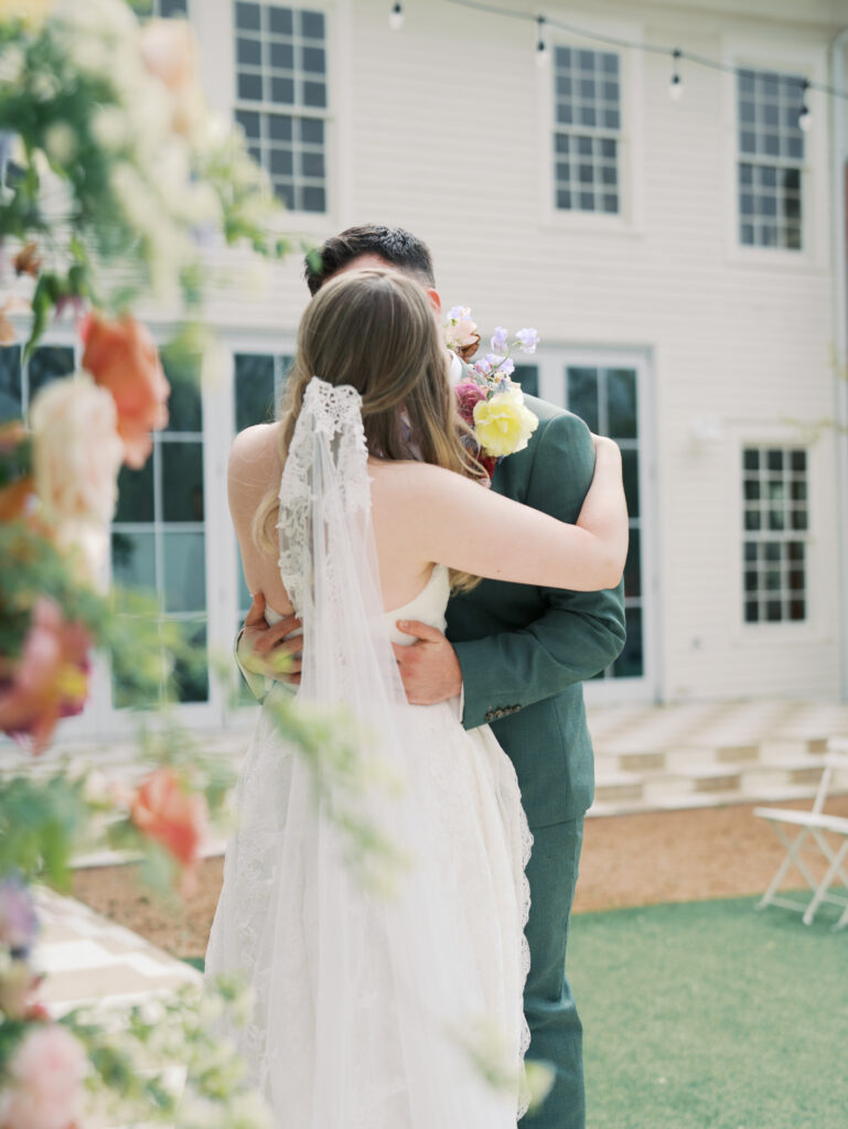 bride and groom kissing on wedding day