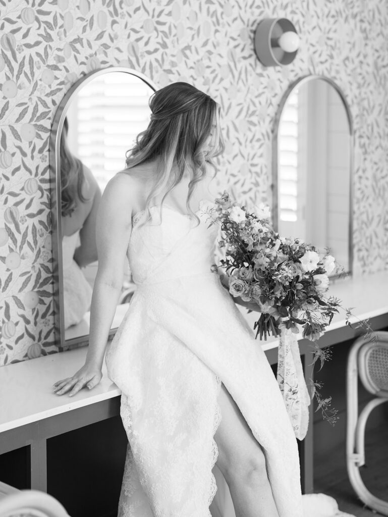 austin wedding florist makes her own bridal bouquet with spring wedding colors and flowers