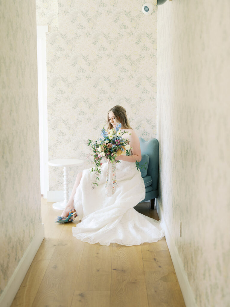 austin wedding florist makes her own bridal bouquet with spring wedding colors and flowers