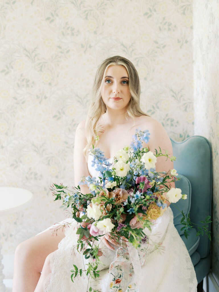 austin wedding florist makes her own bridal bouquet with spring wedding colors and flowers