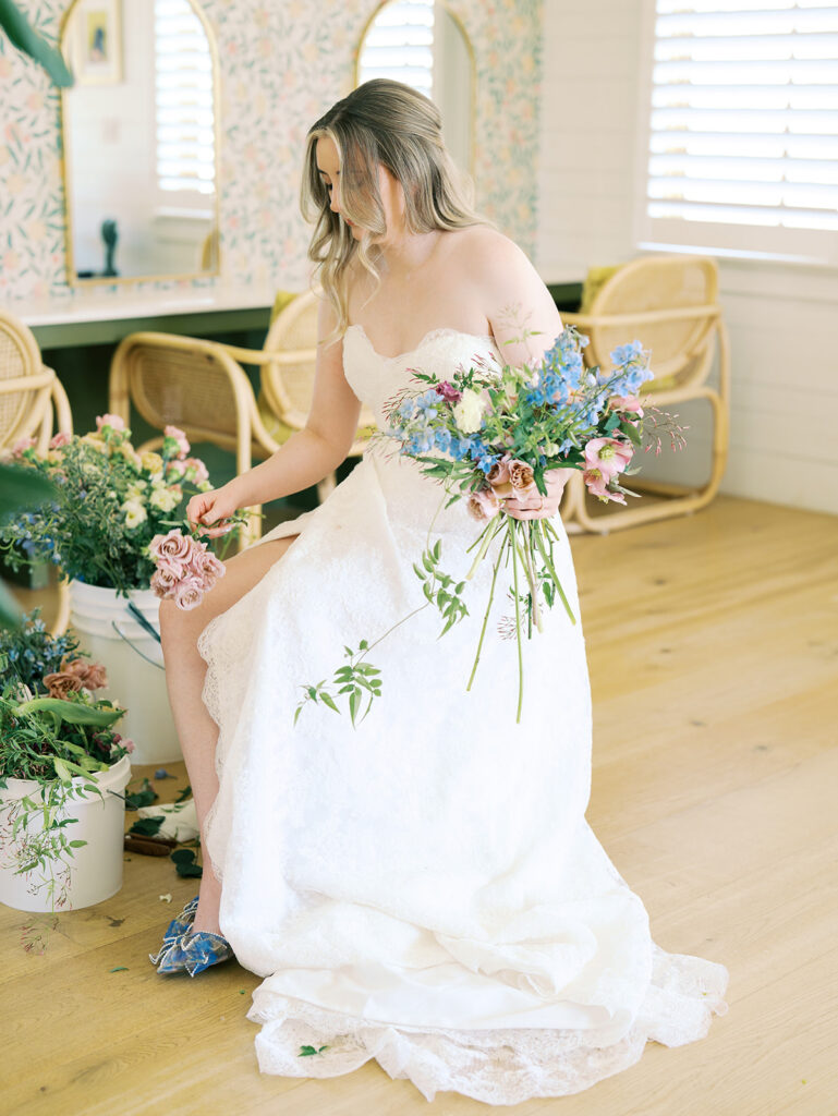 indoor bridal portraits at an austin wedding venue with bright spring florals