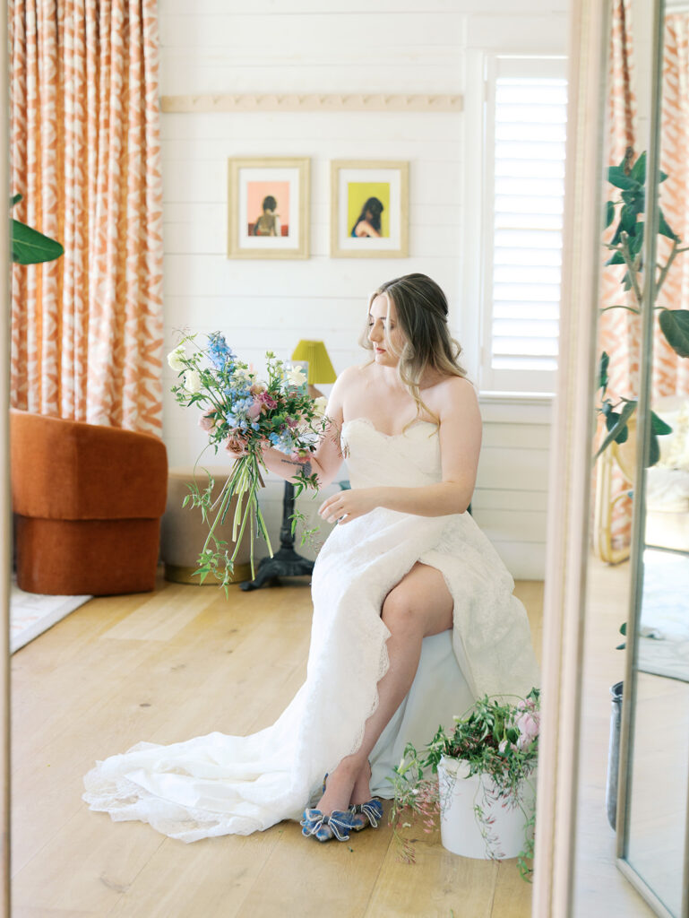 indoor bridal portraits at an austin wedding venue with bright spring florals