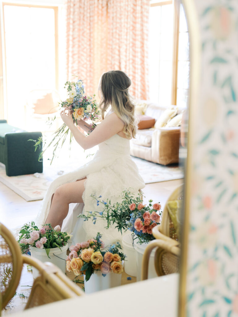 indoor bridal portraits at an austin wedding venue with bright spring florals