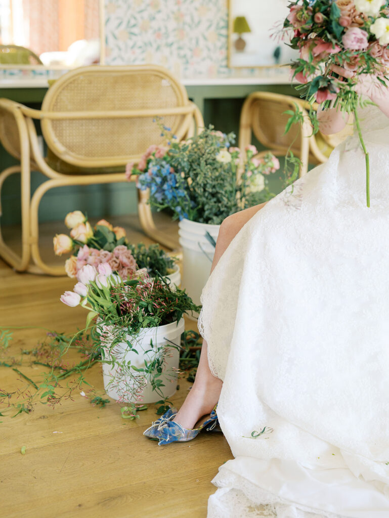 austin wedding florist makes her own bridal bouquet with spring wedding colors and flowers