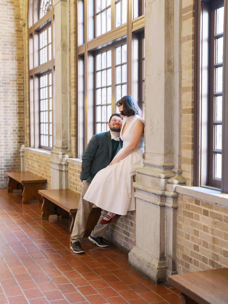 indoor couples photoshoot in a classy library