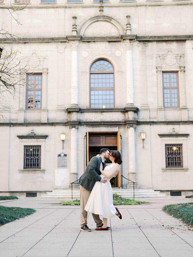 couple standing in front of the julia ideson library in housron texas