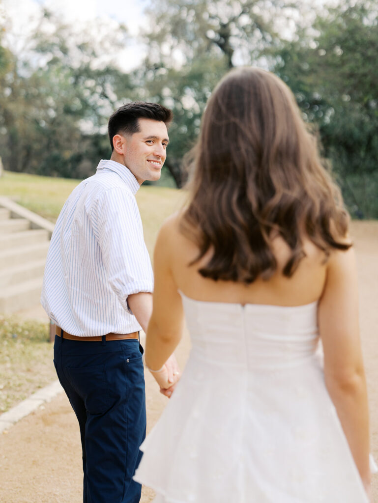 couples photoshoot outfits white engagement dress and white dress shirt