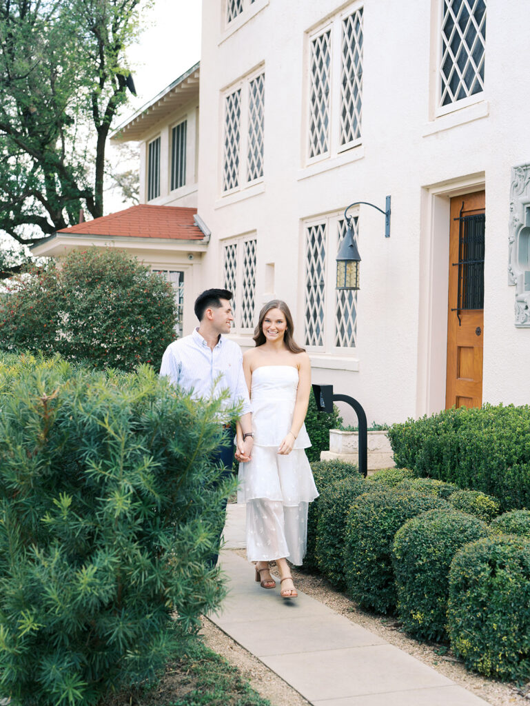 couples photoshoot outfits white engagement dress and white dress shirt