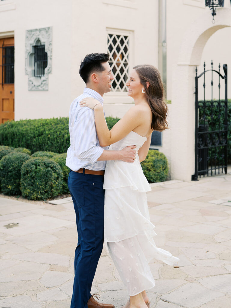 couples photoshoot outfits white engagement dress and white dress shirt