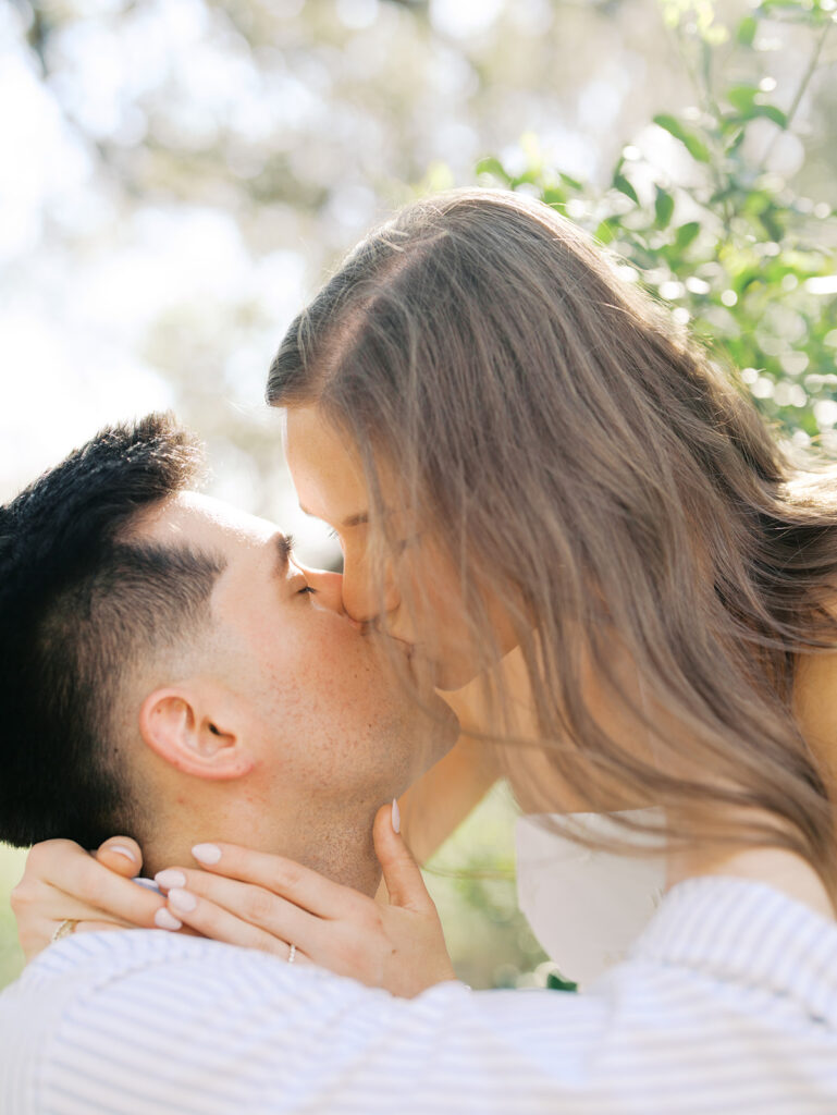 couple kissing pose in austin texas for engagement photoshoot