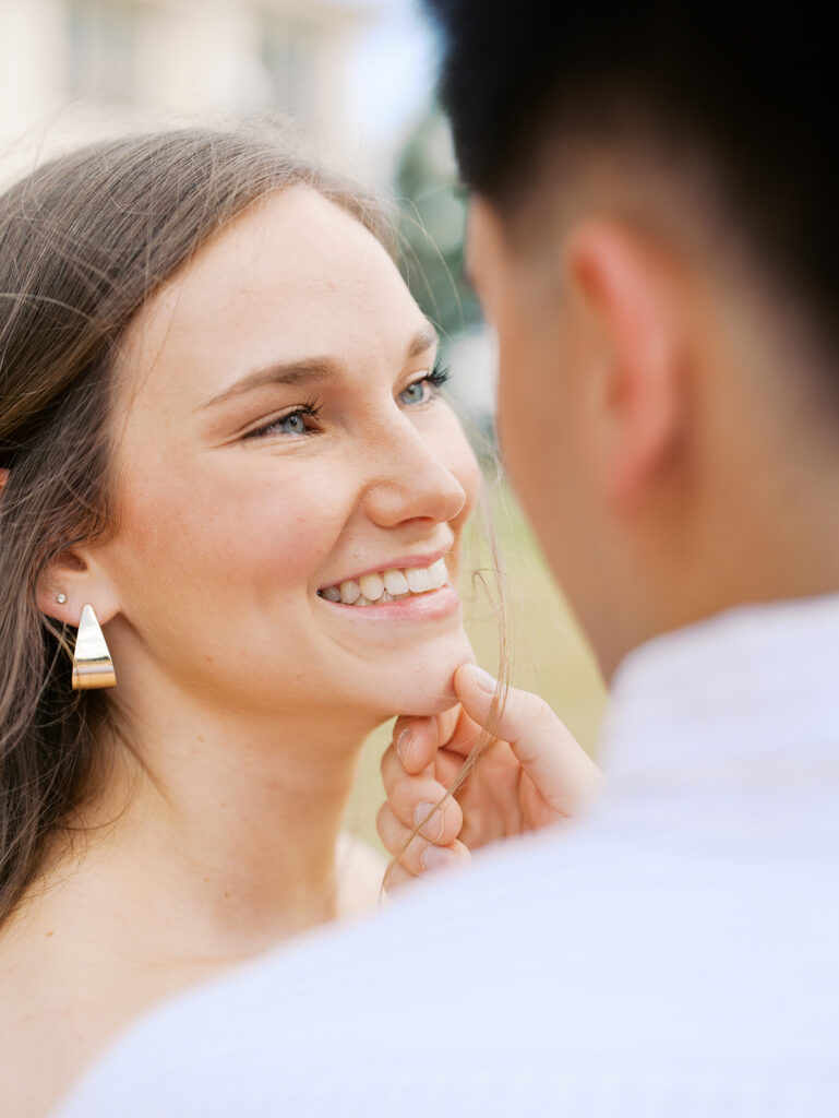 couples photoshoot outfits white engagement dress and white dress shirt