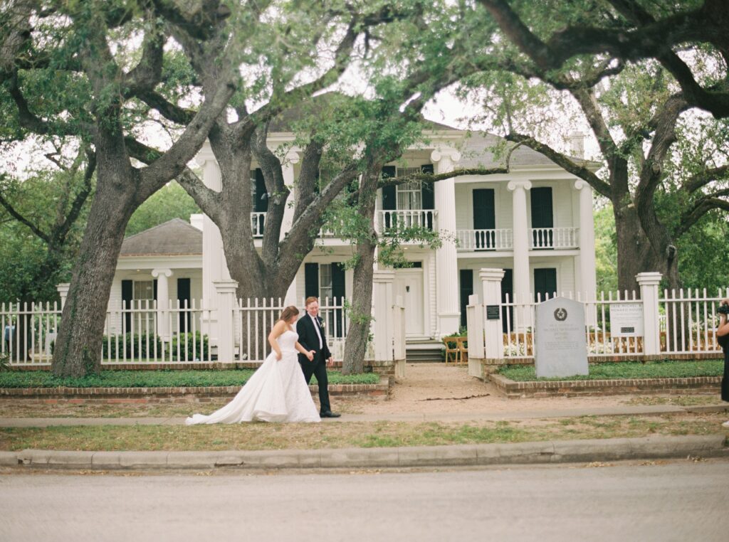 bride and groom walking on wedding day 