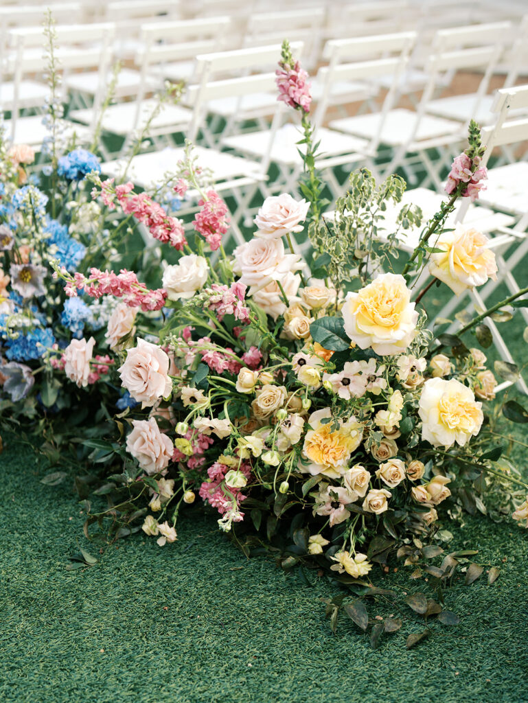 film wedding photography of wedding aisle flowers for a spring garden wedding in austin