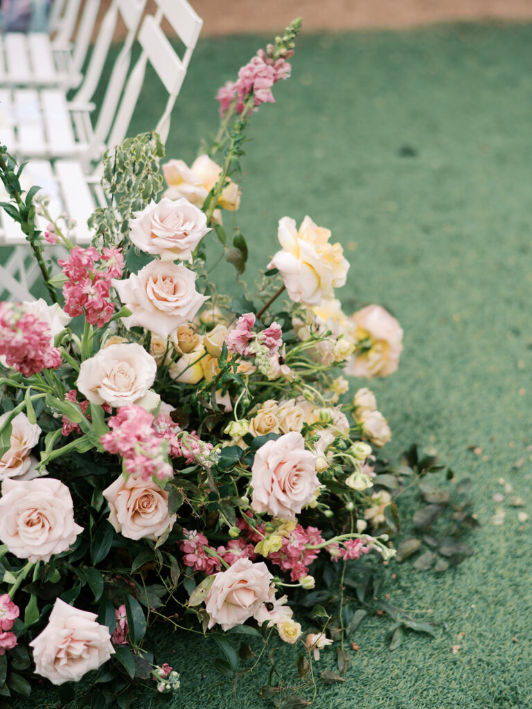 film wedding photography of wedding aisle flowers for a spring garden wedding in austin