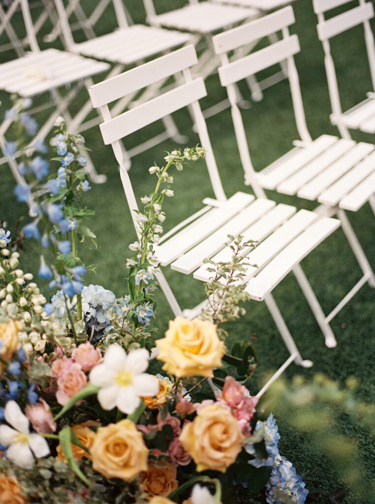 film wedding photography of wedding aisle flowers for a spring garden wedding in austin