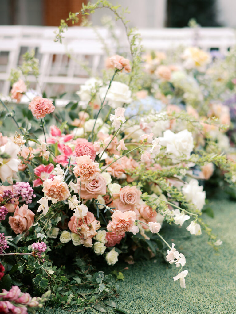 film wedding photography of wedding aisle flowers for a spring garden wedding in austin