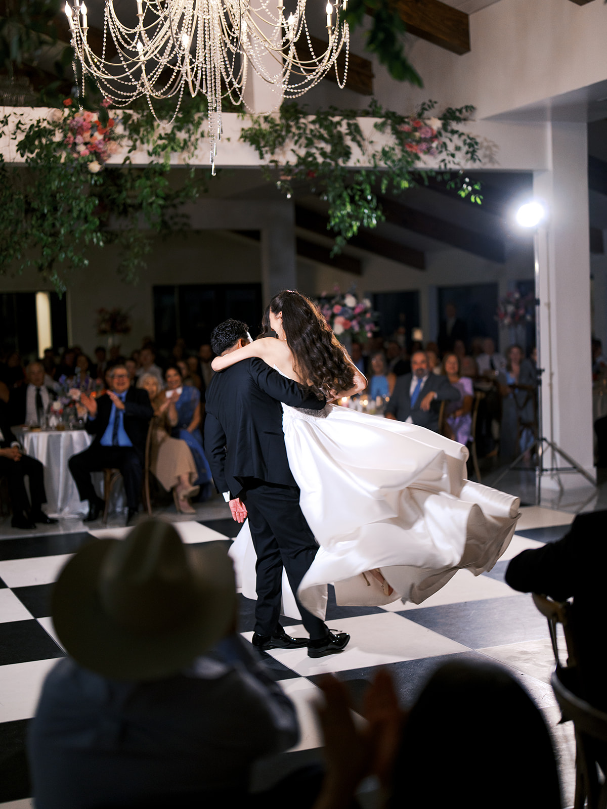 bride and groom dancing together